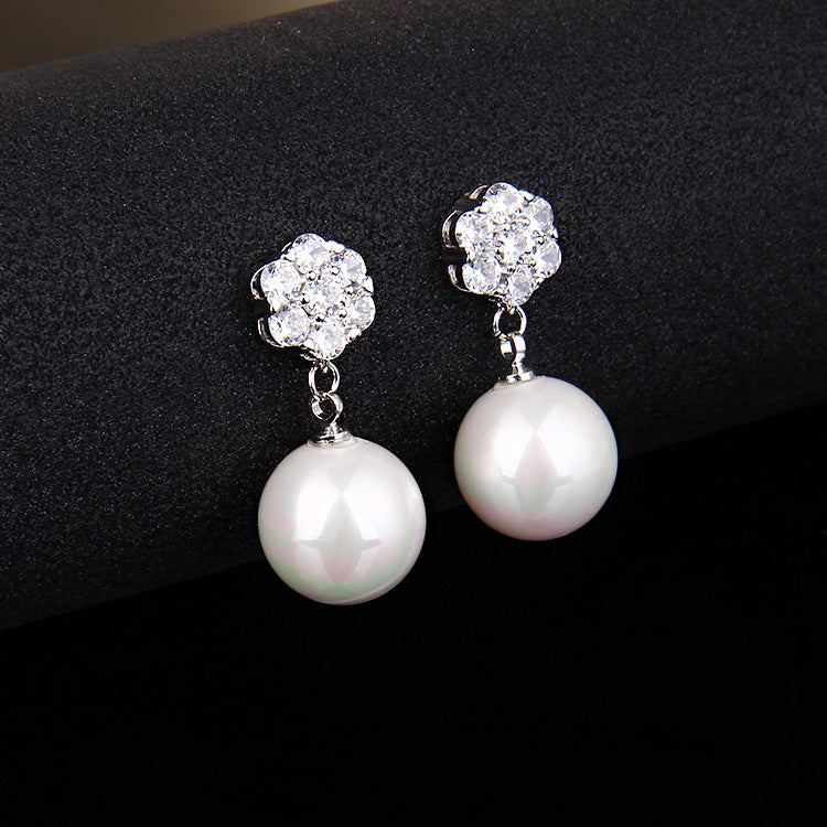 Round pearl long earrings